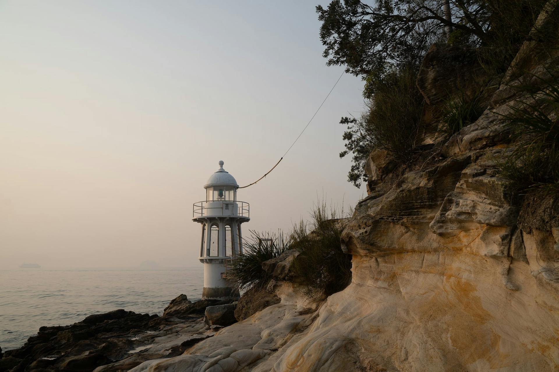 A lighthouse on a tiny island.